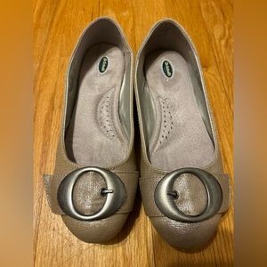 Dr. Scholl’s gold flats with buckle.